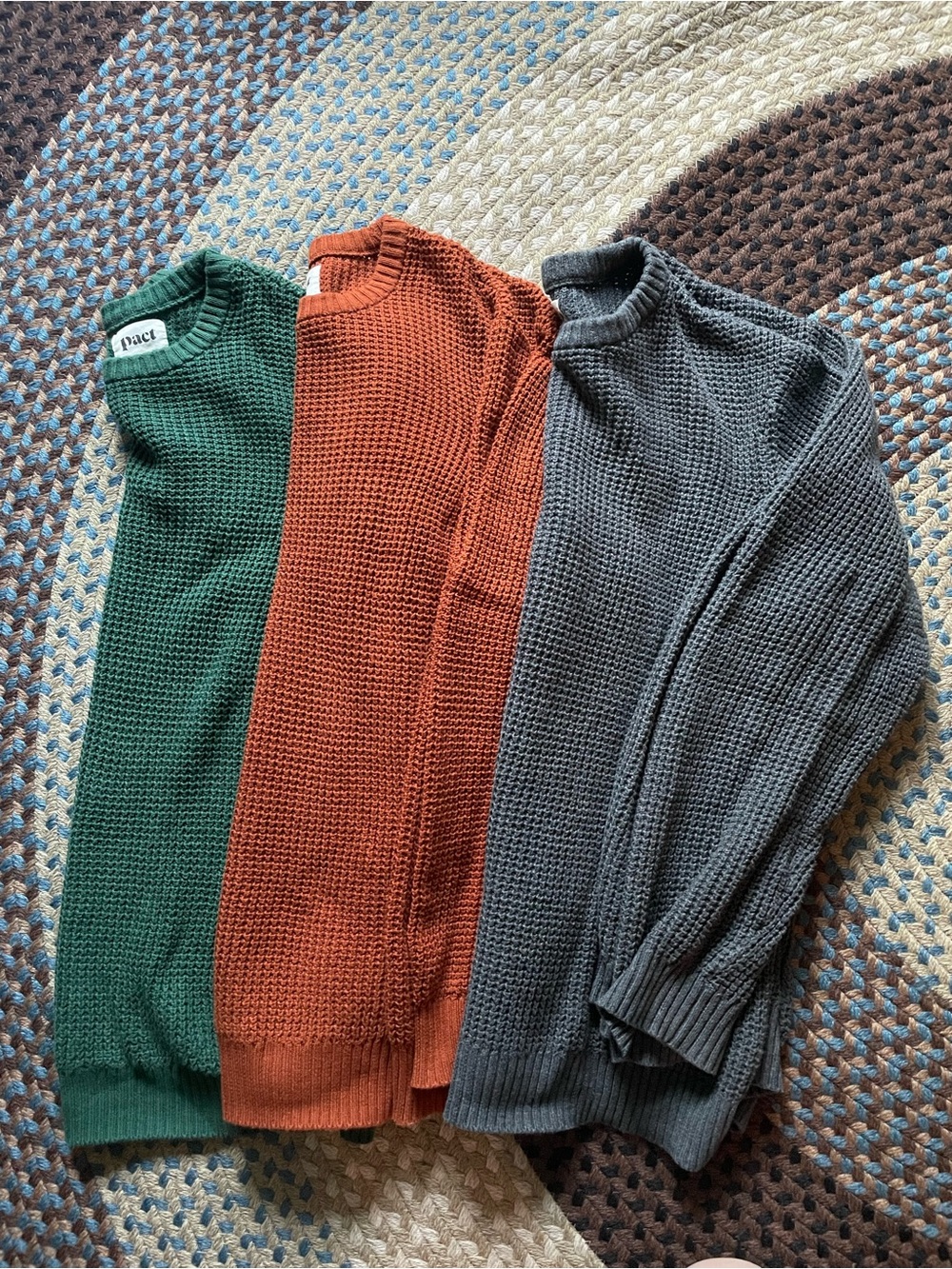 Pact Men's Crewneck Sweaters in Green, Rust, and Gray